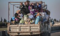 people fleeing bombing in syria