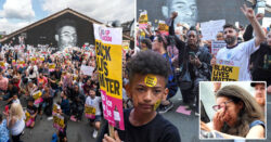 Hundreds of people take the knee beside recently-repaired Rashford mural