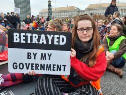 More than 120 people arrested after climate protesters block bridge in central London