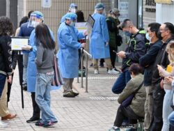 Omicron-hit Hong Kong seeks out hotel rooms for COVID quarantine