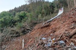 China plane crash: charred belongings found