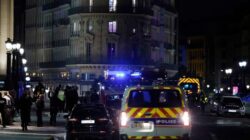 Paris police shoot two people dead in night of unrest after Macron win