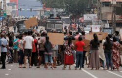 Sri Lanka cabinet resigns after anti-government protesters defy curfew