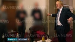 Photos appear to show Boris Johnson toasting a colleague during lockdown party