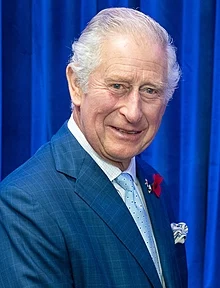 Prince Charles makes Bond-style entrance to Commonwealth Games as he dazzles with Camilla