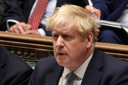 Boris Johnson fights for political survival as cabinet ministers quit