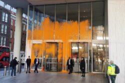 Arrests made after Just Stop Oil activists spray orange paint on buildings