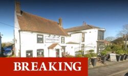 Double-stabbing outside quiet village pub sparks murder investigation as two arrested