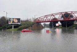 Search resumes for woman swept into river amid heavy rain