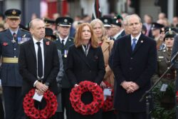 Taoiseach and NI Secretary lay wreaths at Remembrance ceremony in Enniskillen