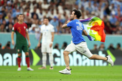 World Cup pitch invader carrying pride flag is footballer with history of protests