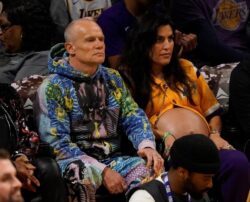 Red Hot Chili Peppers’ Flea and heavily pregnant wife Melody Ehsani upstaged by her eye-catching baby bump look