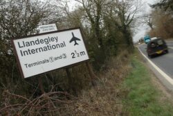 Man who spent £25,000 on fake airport sign is taking it down after 20 years