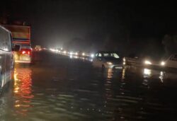 Cars abandoned in floods and trains cancelled due to heavy downpours