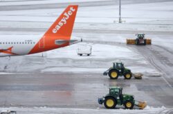 Passengers stuck at Manchester Airport ‘for hours’ after snow shuts runways