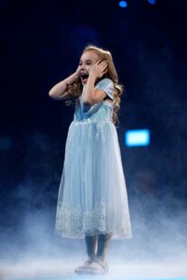 Ukrainian girl who went viral for singing Let It Go surprised by Frozen cast on stage for emotional performance