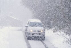 Amber weather warning in force as snow brings travel disruption