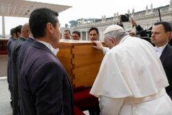 Historic goodbye after Pope lays hand on Benedict’s coffin before he is buried