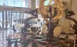 Furious guest smashes sports car through luxury hotel lobby