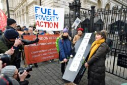 Protesters carry coffin to Downing Street in anger at cold-related deaths