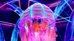 Amber Riley revealed as Jellyfish on The Masked Singer UK as Glee star become latest celebrity eliminated – months after winning US show