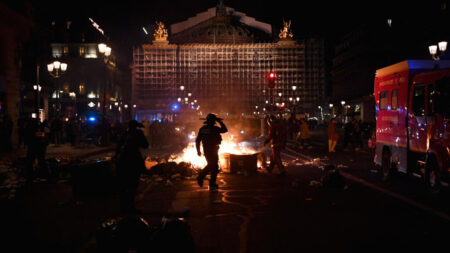 Protests erupt in France as govt adopts new pension law