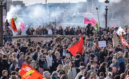 Paris protests: Macron pushes French pension bill through without vote