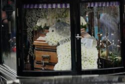 Paul O’Grady reunited with best friend Buster as flower wreath in beloved dog’s image accompanies him to final resting place