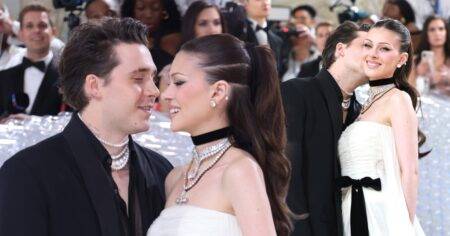 Brooklyn Beckham puckers up and goes for wife Nicola Peltz’s neck on Met Gala red carpet and it’s giving Edward Cullen