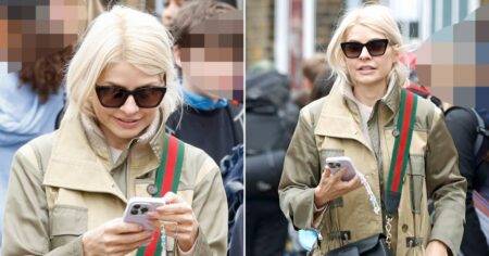 Holly Willoughby can’t keep off her phone as she’s seen for first time since Phillip Schofield ‘feud’