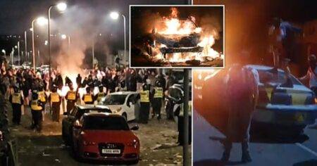 Masked yobs torch cars and clash with riot police on night of carnage in Cardiff