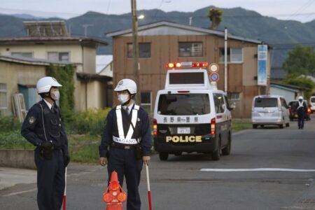 People in Japanese city told to stay inside after attack by camouflaged gunman