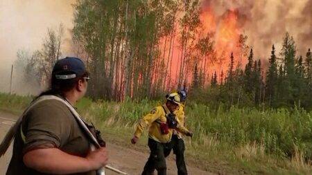 Thousands evacuate as Nova Scotia fights wildfires