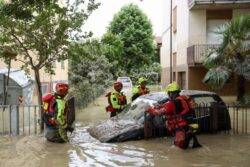 At least 13 dead as devastating floods force 13,000 from their homes 