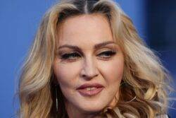 Madonna postpones tour after intensive care stay