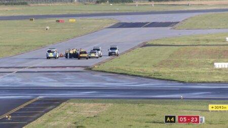 Germany: Climate activists glue themselves to runways, causing major travel disruption