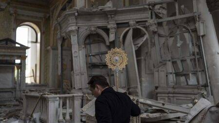 Residents in Odesa clear rubble after sustained Russian shelling