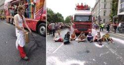 Just Stop Oil block Pride in London parade and spray paint over road