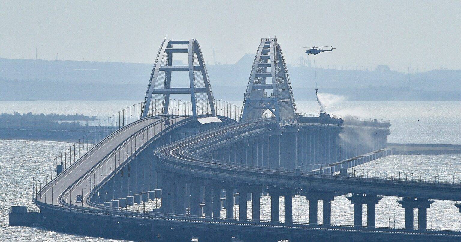 Reports of explosions and two deaths on bridge linking Crimea to Russia