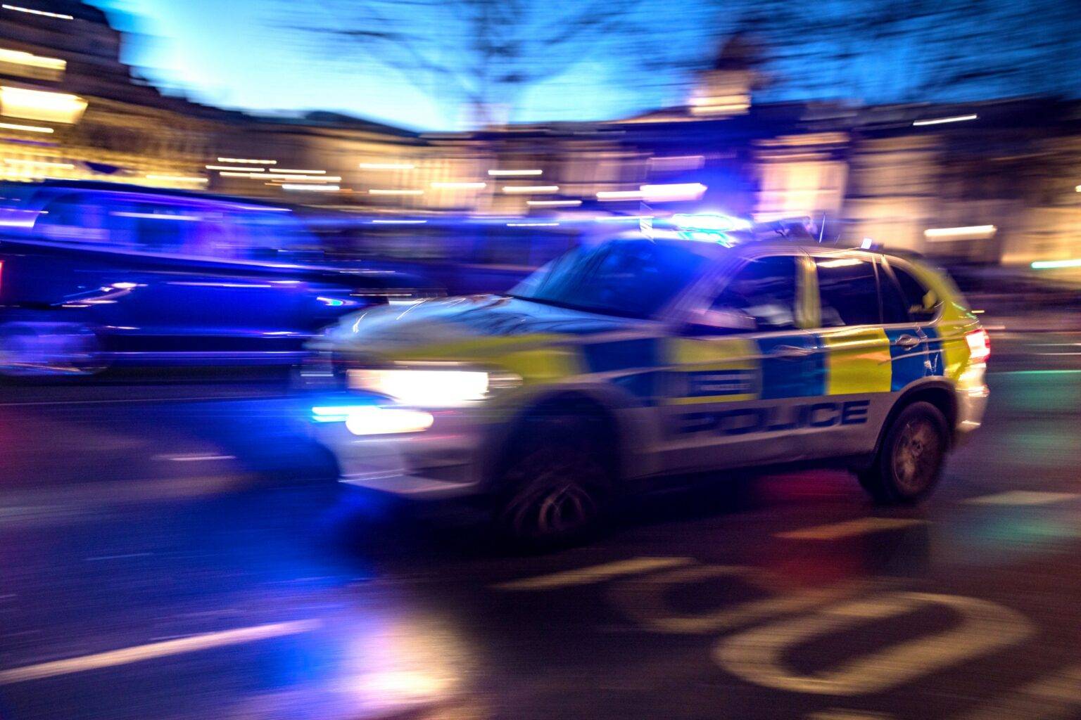 Man arrested after two people stabbed at hotel and garage