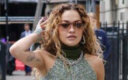 Rita Ora rocks knitted crop top despite the heat in casual stroll around London