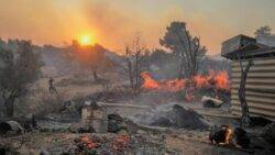 In pictures: Greece faces longest heatwave on record as wildfires force evacuations