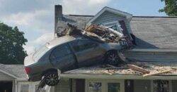 Car ‘intentionally’ crashes into home and dangles from second floor