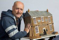 Man painstakingly rebuilds ‘Britain’s wonkiest pub’ brick by brick – in miniature form