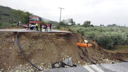 Watch: Cars trapped and locals survey damage as flooding hits Greece