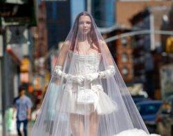 Julia Fox swaps aisle for New York streets as she stuns in outrageous wedding dress and fur-lined veil