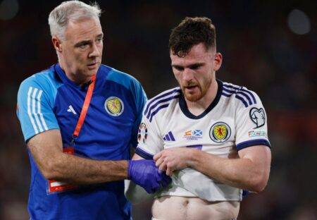 Liverpool suffer Andy Robertson injury scare as defender is forced off with Scotland