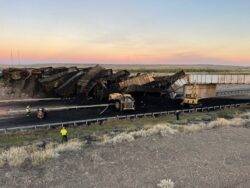 Massive train derailment kills truck driver after trapping them under pile of coal