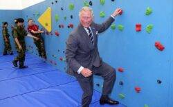 King Charles goes viral in unearthed ‘Mission Impossible’-style clip climbing wall in suit