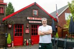 Man transforms shed into fire-station style pub complete with pole and hose